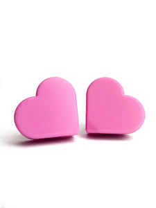 light pink color heart shaped roller skate toe stop on a white background