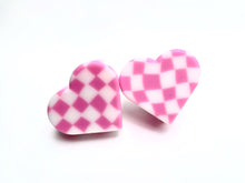 Load image into Gallery viewer, heart shaped roller skate toe stop in a pink and white checkered pattern on a white background 