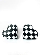 Load image into Gallery viewer, heart shaped roller skate toe stop in a black and white checkered pattern on a white background 