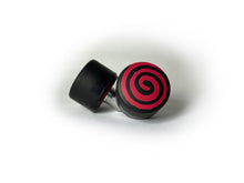 Load image into Gallery viewer, round roller skate toe stop in a black color with a red swirl through it on a white background.