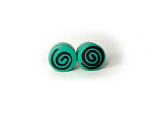 Load image into Gallery viewer, teal color round roller skate toe stop with a black swirl through it on a white background. .
