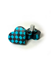 Load image into Gallery viewer, black and blue checker patterned heart shaped roller skate toe stop on a white background