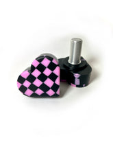 Load image into Gallery viewer, pink and black checker patterned heart shaped roller skate toe stop on a white background
