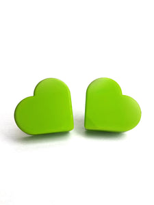 green color heart shaped roller skate toe stop on a white background