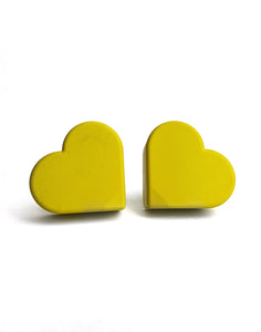 yellow color heart shaped roller skate toe stop on a white background