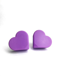 purple color heart shaped roller skate toe stop on a white background