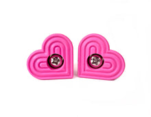 Load image into Gallery viewer, pink color heart shaped roller skate toe stop with a bolt in the center on a white background